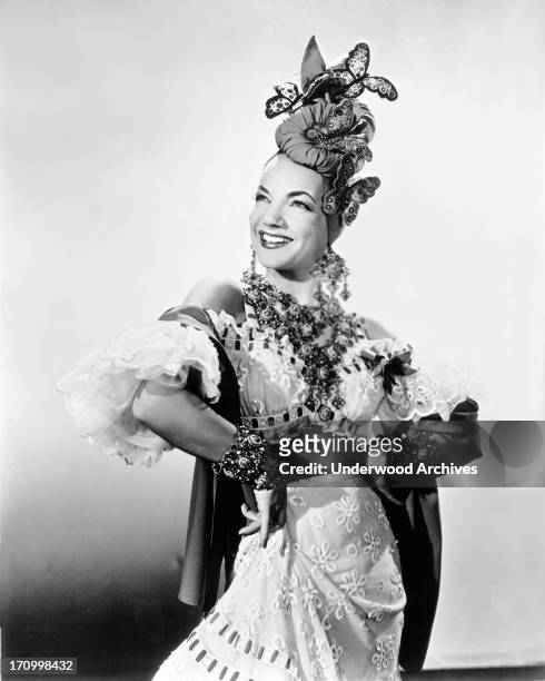 Singer, dancer, actress and movie star Carmen Miranda in an elaborate outfit, Hollywood, California, 1942.