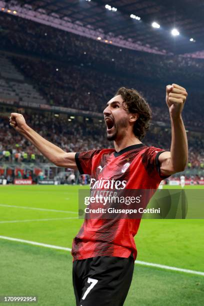 Yacine Adli of AC Milan celebrates after his team-mate Christian Pulisic scored during the Serie A TIM match between AC Milan and SS Lazio at Stadio...