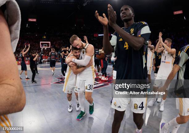 Dzanan Musa, #31 of Real Madrid and Facundo Campazzo, #7 of Real Madrid celebrate at the end of the 2023-24 Turkish Airlines EuroLeague Regular...