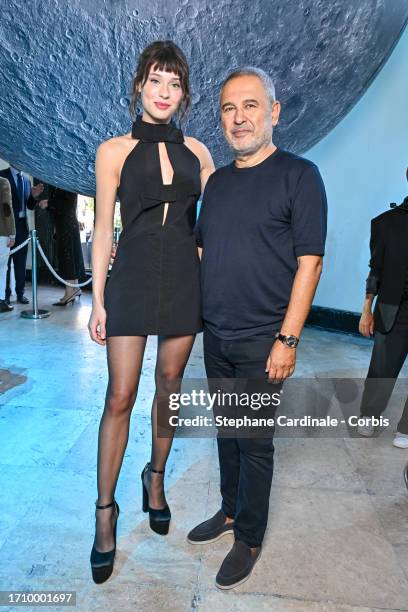 Daniela Melchior and Elie Saab pose backstage prior to the Elie Saab Womenswear Spring/Summer 2024 show as part of Paris Fashion Week on September...
