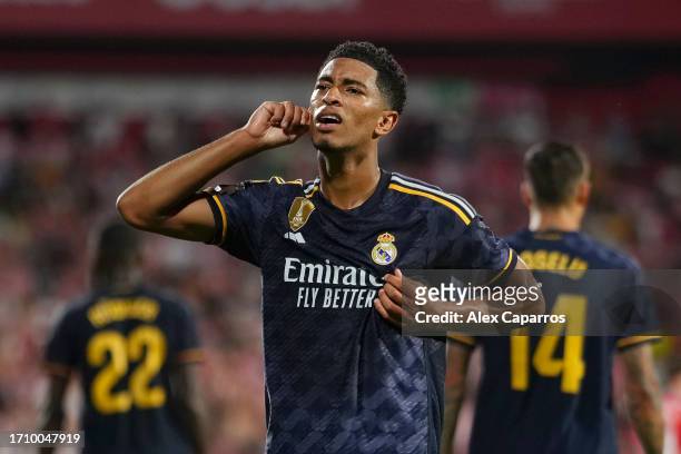Jude Bellingham of Real Madrid celebrates after scoring the team's third goal during the LaLiga EA Sports match between Girona FC and Real Madrid CF...