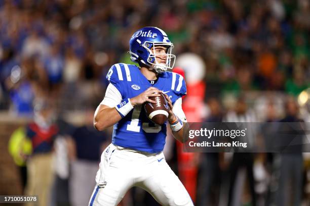 Riley Leonard of the Duke Blue Devils drops back to pass against the Notre Dame Fighting Irish at Wallace Wade Stadium on September 30, 2023 in...