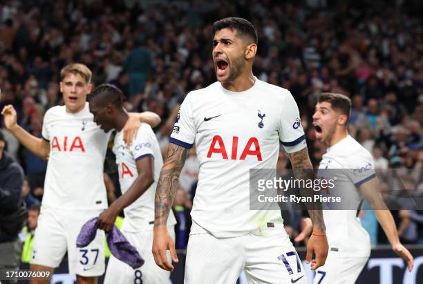 Cristian Romero of Tottenham Hotspur celebrates after Joel Matip of Liverpool scores an own goal during the Premier League match between Tottenham...