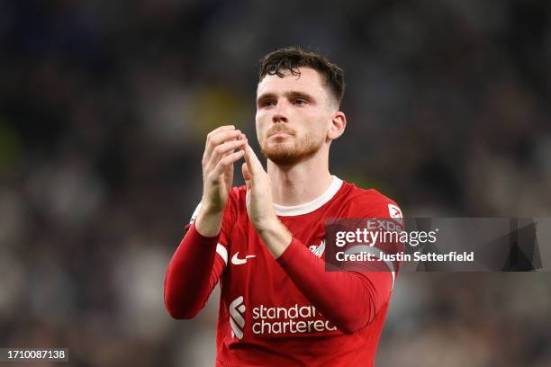 Andrew Robertson of Liverpool applauds the fans following the team's loss during the Premier League match between Tottenham Hotspur and Liverpool FC...