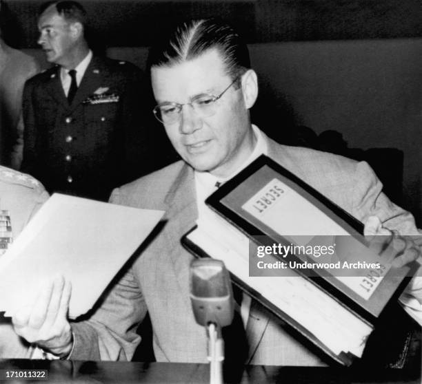 Secretary of Defense Robert McNamara as he prepares to testify before the House Military Operations subcommittee about President Kennedy's civil...