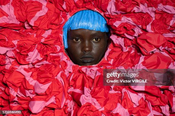 Model walks the runway during the Comme des Garcons Ready to Wear Spring/Summer 2024 fashion show as part of the Paris Fashion Week on September 30,...