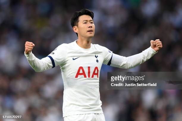 Heung-Min Son of Tottenham Hotspur celebrates after scoring the team's first goal during the Premier League match between Tottenham Hotspur and...