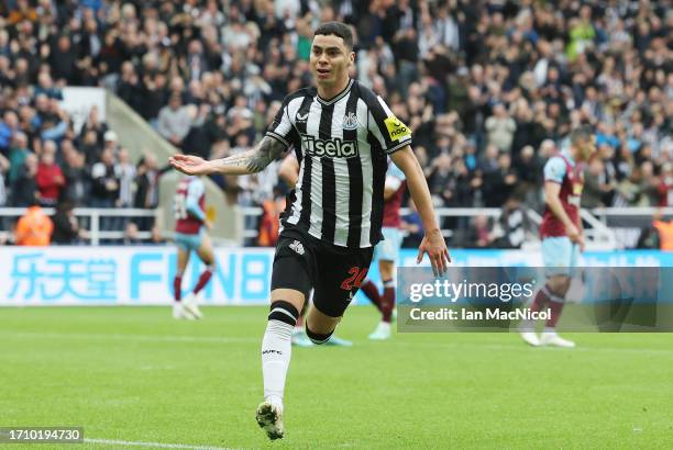 Miguel Almiron of Newcastle United celebrates after scoring the team's first goal during the Premier League match between Newcastle United and...