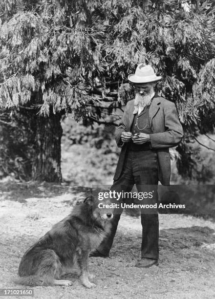 Photograph of author and naturalist John Muir and his dog. California, California, 1900.