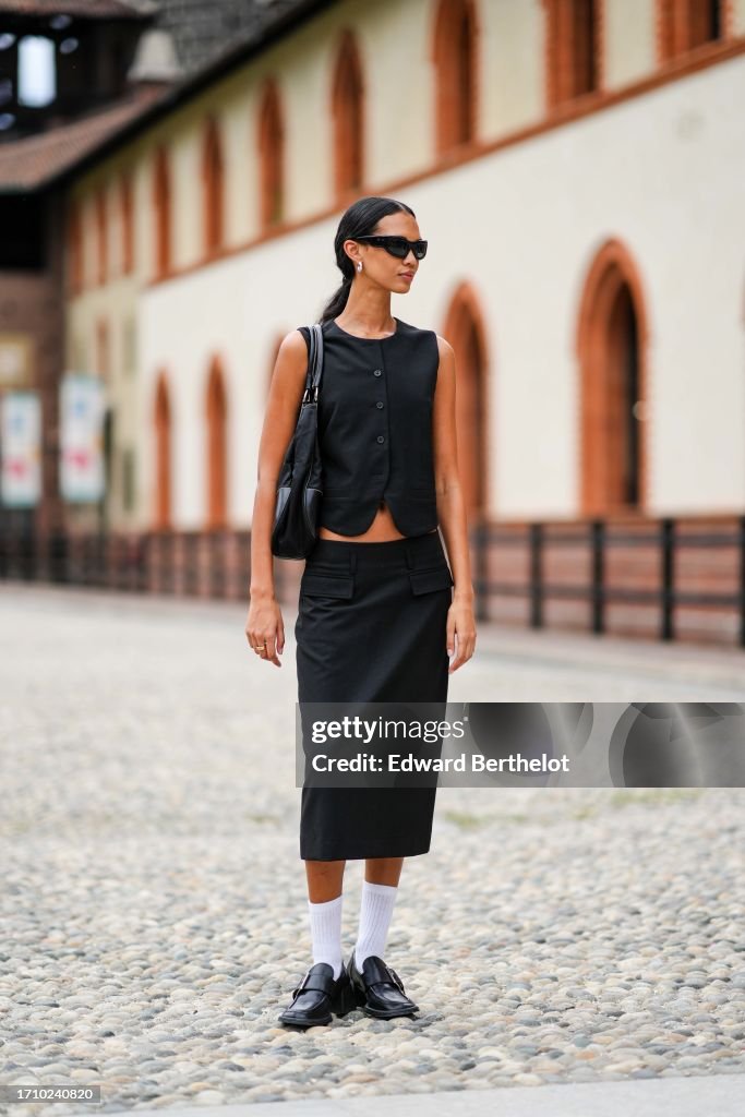 Street Style - Day 2 - Milan Fashion Week - Womenswear Spring/Summer 2024