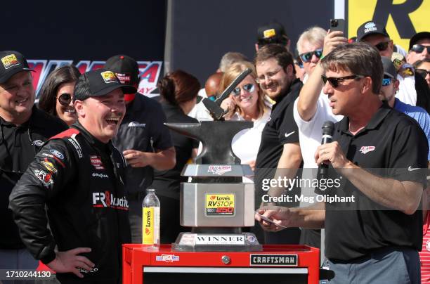 Brett Moffitt, driver of the Fr8Auctions Ford, celebrates in victory lane after winning the NASCAR Craftsman Truck Series Love's RV Stop 250 at...