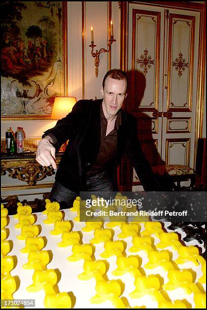 David Linx next to the vertebra shaped candles by the sulptor Pierre Buisseret - Party at the Belgian ambassador's place for the release of the book...