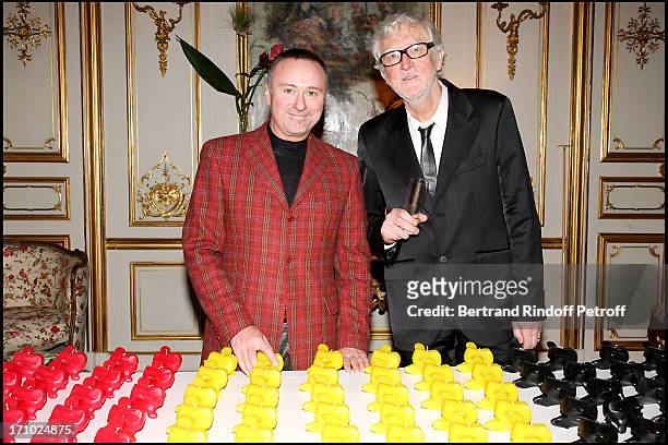 Pierre Dominique Schmidt and Pierre Buisseret next to his sculptures - Party at the Belgian ambassador's place for the release of the book "Belges En...