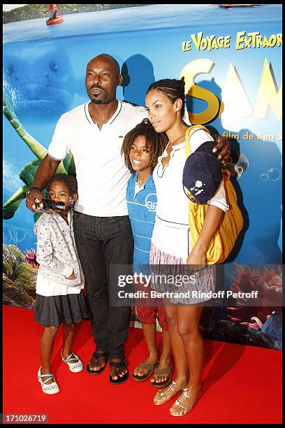 Jimmy Jean Louis and family, Jasmin, Thevijin, Evelyn at Premiere Of Film "Le Voyage Extraordinaire De Samy" At Cinema Gaumont Opera In Paris.