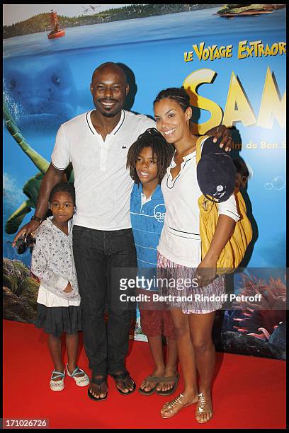 Jimmy Jean Louis and family, Jasmin, Thevijin, Evelyn at Premiere Of Film "Le Voyage Extraordinaire De Samy" At Cinema Gaumont Opera In Paris.