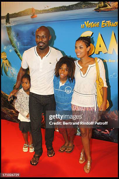 Jimmy Jean Louis and family, Jasmin, Thevijin, Evelyn at Premiere Of Film "Le Voyage Extraordinaire De Samy" At Cinema Gaumont Opera In Paris.