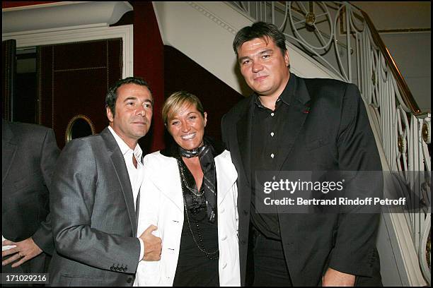 Bernard Montiel, David Douillet and his wife Valerie - Surprise birthday of Mireille Darc on the stage of the Marigny theater by Alain Delon at the...