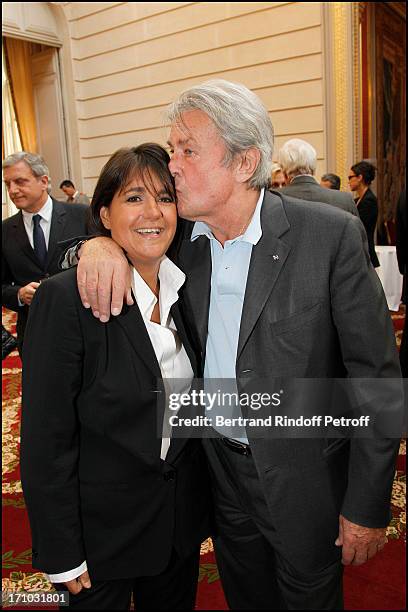 Valerie Expert, Alain Delon at Actress Mireille Darc Received As Commander In the National Order Of Merit During Ceremony At Elysee Palace.