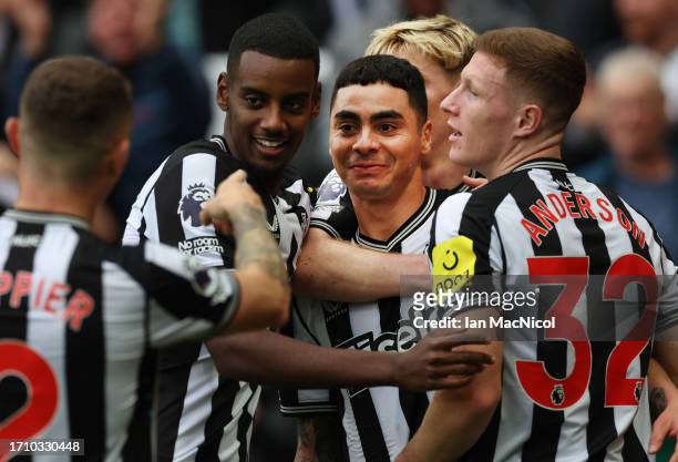 Miguel Almiron of Newcastle United celebrates after scoring the team's first goal during the Premier League match between Newcastle United and...