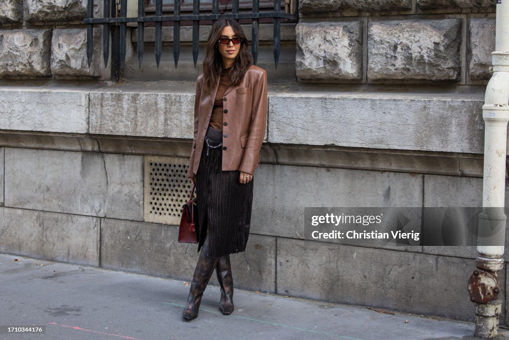 Street Style - Paris Fashion Week - Womenswear Spring/Summer 2024 - Day Six