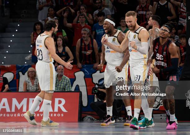 Real Madrid players react at the end of the 2023-24 Turkish Airlines EuroLeague Regular Season Round 1 game between Baskonia Vitoria Gasteiz and Real...