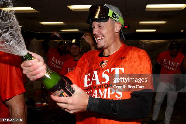 Ryan Mountcastle of the Baltimore Orioles celebrates in the locker after the Orioles defeated the Boston Red Sox to win the the American League East...