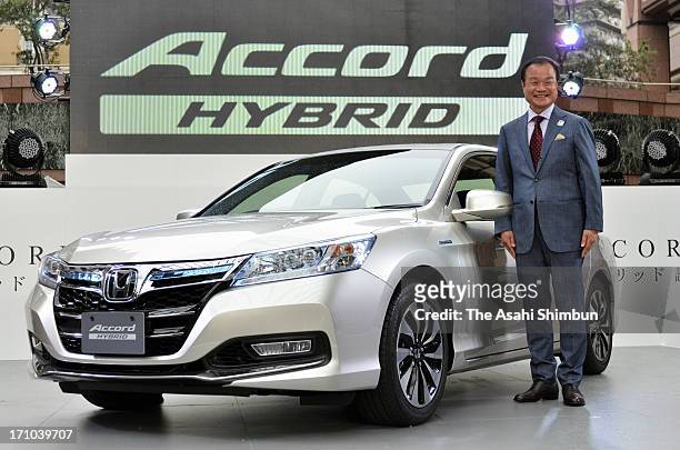 Honda Motor Co President Takanobu Ito introduces new 'Accord Hybrid' is displayed at its launching on June 20, 2013 in Tokyo, Japan. The car,...