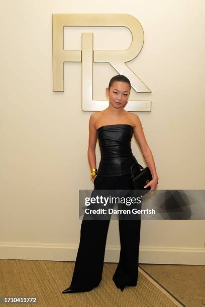 Yan Yan Chan, wearing Ralph Lauren, attends an intimate dinner at Ralph's during Paris Fashion Week to celebrate the launch of The RL 888 handbag on...