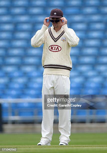 Kevin Pietersen of Surrey takes off his sunglasses during day one of the LV County Championship Division One match between Yorkshire and Surrey at...