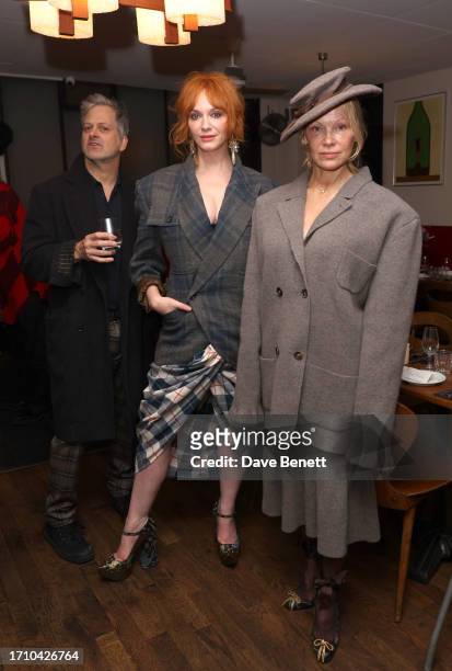 George Bianchini, Christina Hendricks and Pamela Anderson attend the Andreas Kronthaler for Vivienne Westwood Paris Fashion Week Dinner at Restaurant...