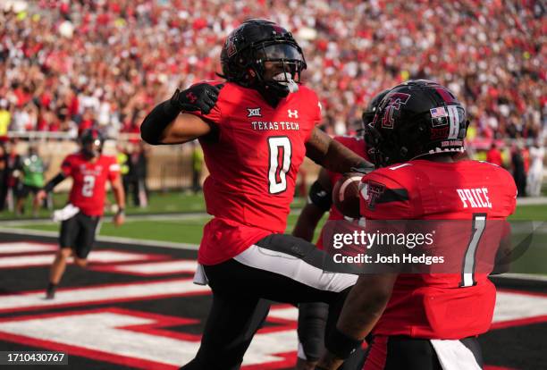 Cam'Ron Valdez of the Texas Tech Red Raiders celebrates after a rushing touchdown during the fourth quarter against the Houston Cougars at Jones AT&T...