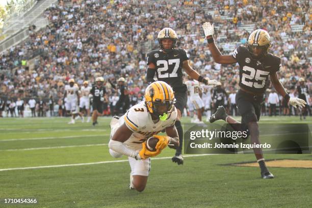 Luther Burden III of the Missouri Tigers catches a touchdown pass during the second half of the game against the Vanderbilt Commodores at FirstBank...