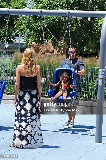 Heidi Klum, Martin Kristen, and Lou Sulola Samuel as seen on June 20, 2013 in New York City.