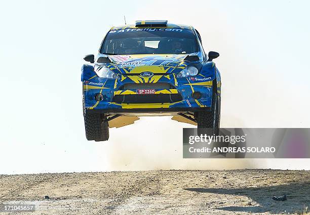 Sweden's PerGunnar Andersson steers his Ford Fiesta RS WRC during the stage one of today's special stages of the FIA World Rally Championship of...