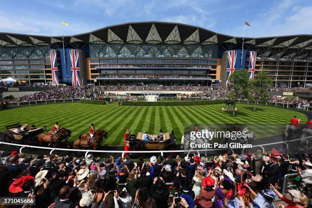General view as Queen Elizabeth II arrives for day four of Royal Ascot at Ascot Racecourse on June 20, 2013 in Ascot, England.