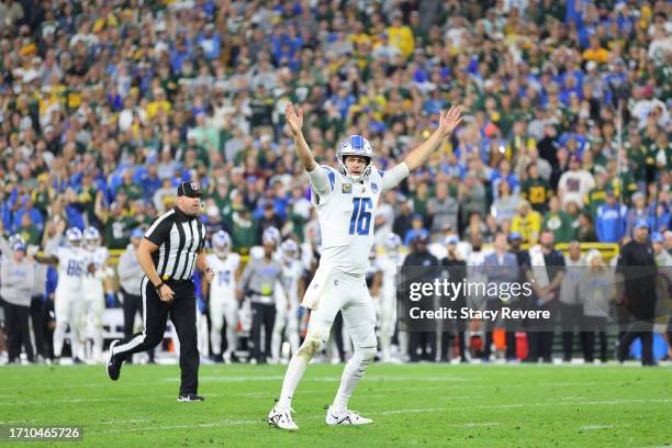 Jared Goff of the Detroit Lions celebrates a touchdown during a game against the Green Bay Packers at Lambeau Field on September 28, 2023 in Green...