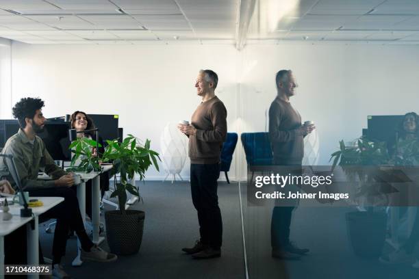 group of business people having meeting in office - office politics stock pictures, royalty-free photos & images