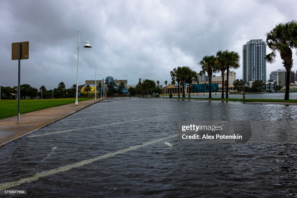 Storm aftermath in St. Petersburg, FL. Flooding parking lots on waterfront at dawn