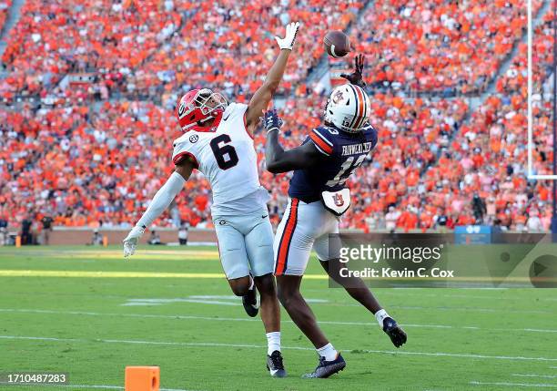 Rivaldo Fairweather of the Auburn Tigers fails to pull in this reception against Daylen Everette of the Georgia Bulldogs during the fourth quarter at...