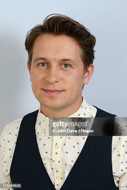 Mark Owen poses for a portrait to promote his new album 'The Art Of Doing Nothing' on May 1, 2013 in London, England.