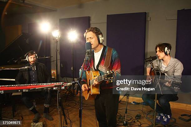 Mark Owen performs for a biz session to promote his new album 'The Art Of Doing Nothing' on May 17, 2013 in London, England.