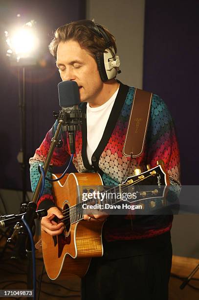 Mark Owen performs for a biz session to promote his new album 'The Art Of Doing Nothing' on May 17, 2013 in London, England.