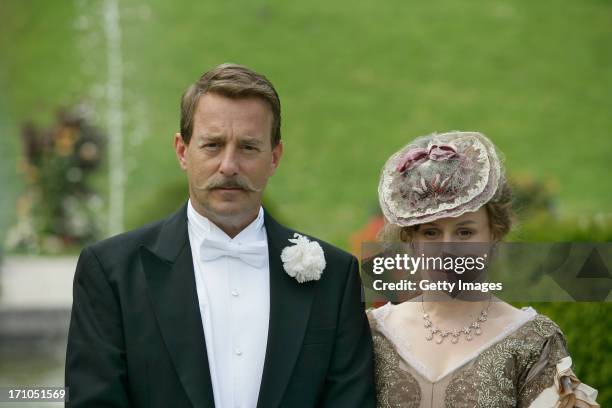 Heino Ferch , Eva Loebau attend the photocall of 'Der Clan. Die Geschichte der Familie Wagner' on June 21, 2013 in Gmunden, Austria.