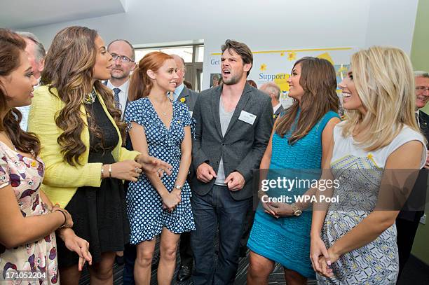 Vanessa White, Rochelle Wiseman, Una Healy and her husband Ben Foden, Frankie Sandford and Mollie King during a visit to a Marie Curie Cancer Care...