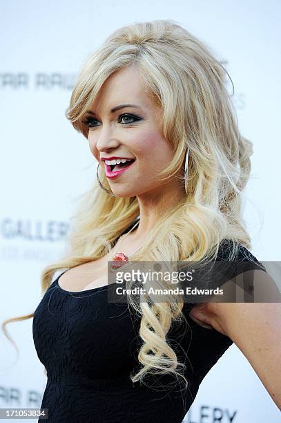 Actress Mindy Robinson arrives at the Leica Store Los Angeles Grand Opening at Leica on June 20, 2013 in Los Angeles, California.