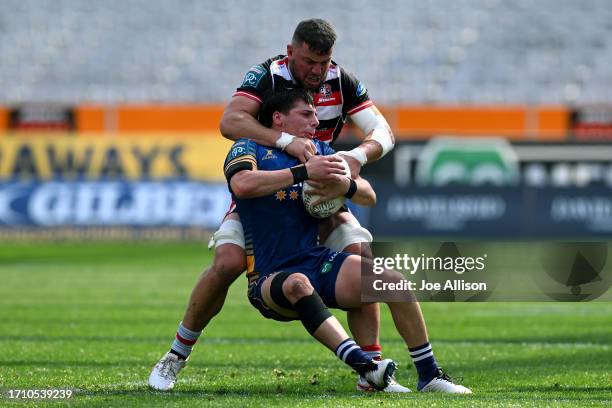 Nathan Hastie of Otago is tackled by Sean Reidy of Counties Manukau during the round nine Bunnings Warehouse NPC match between Otago and Counties...