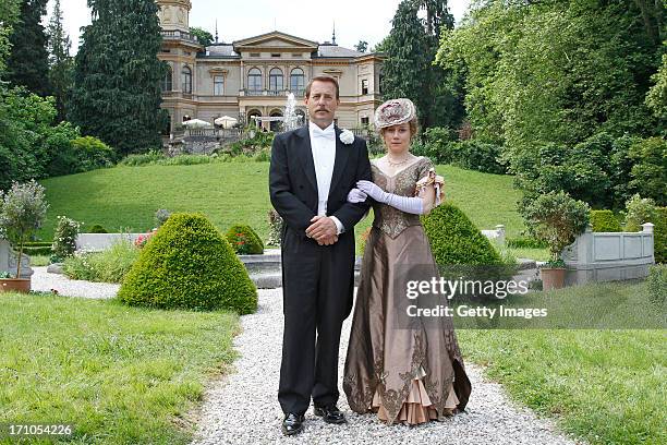 Heino Ferch , Eva Loebau attend the photocall of 'Der Clan. Die Geschichte der Familie Wagner' on June 21, 2013 in Gmunden, Austria.