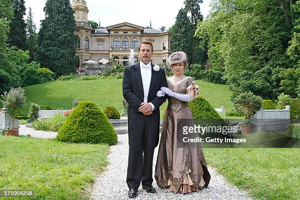 Heino Ferch , Eva Loebau attend the photocall of 'Der Clan. Die Geschichte der Familie Wagner' on June 21, 2013 in Gmunden, Austria.