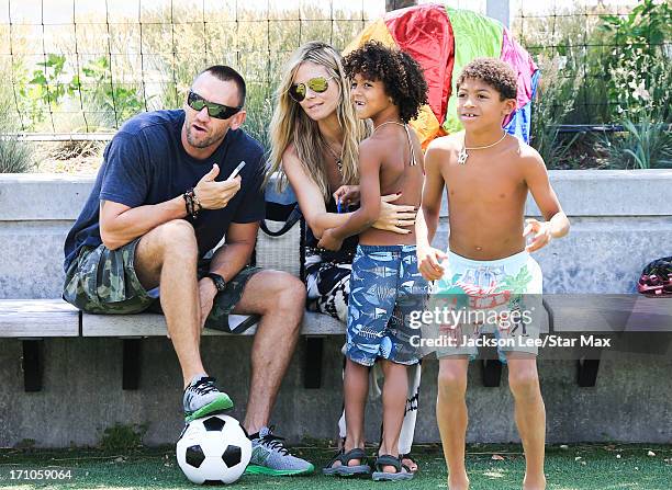 Heidi Klum, Martin Kristen, Henry Samuel and Johan Samuel aare seen on June 20, 2013 in New York City.