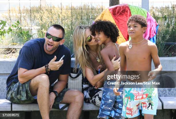 Heidi Klum, Martin Kristen, Henry Samuel and Johan Samuel are seen on June 20, 2013 in New York City.